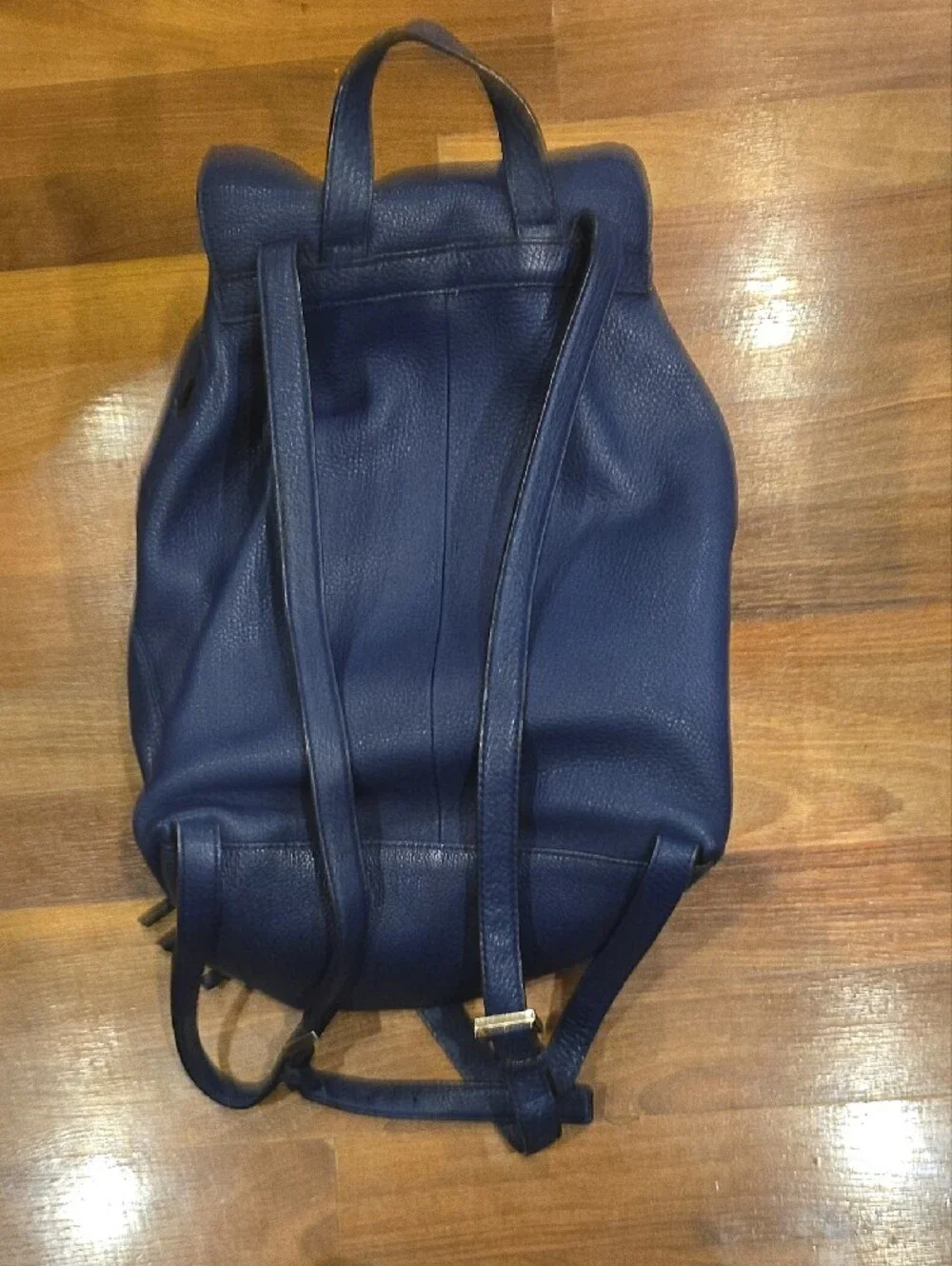 kate spade Navy Leather Drawstring With Gold Accents Backpack